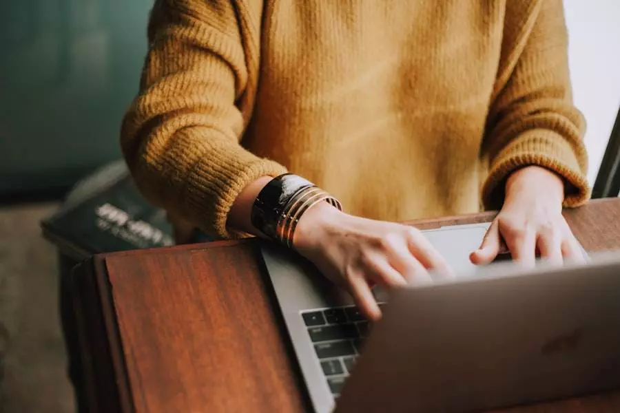 Woman sending email