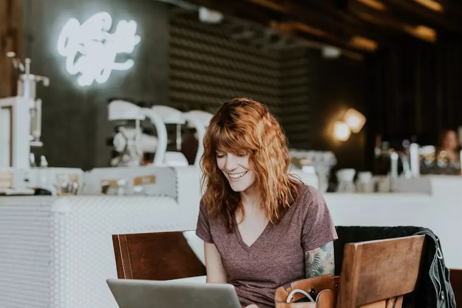 Woman looking at laptop